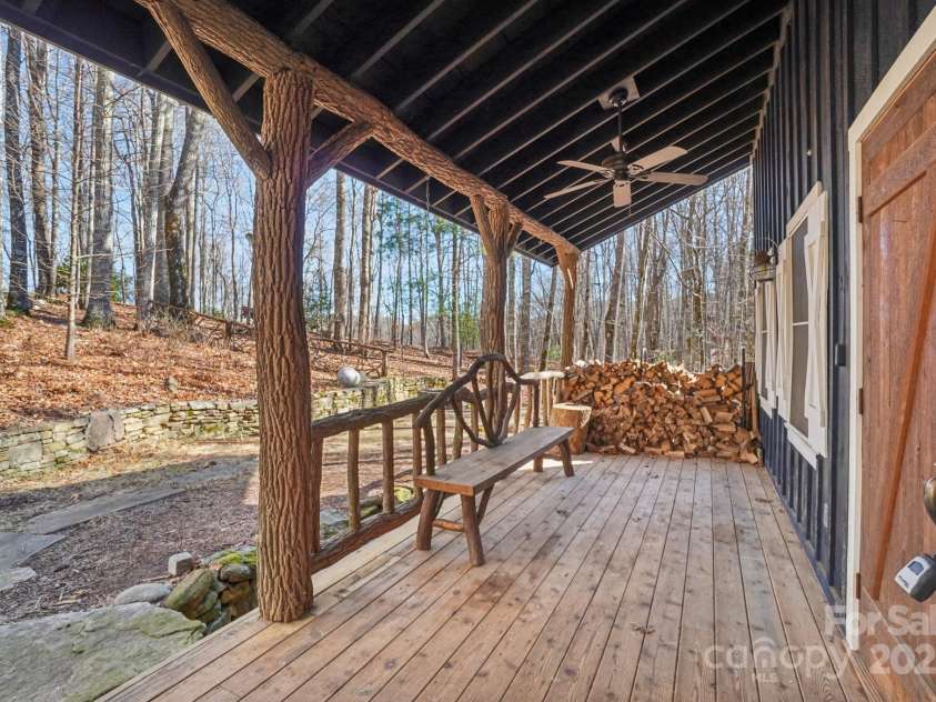 102 Knobster Way, Glenville, NC 28736.  MLS# CAR4325693, YatesRealty ID 3776. While a wooden bench and starter supply of firewood anticipate your arrival.