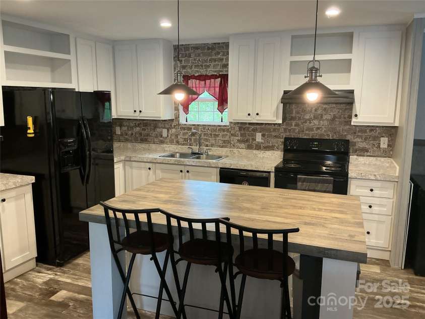 30 and 32 Skyland Circle, Asheville, NC 28804.  MLS# CAR4313510, YatesRealty ID 3776. 