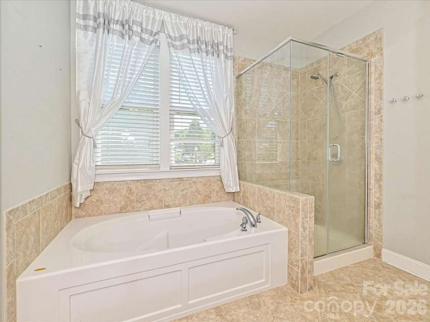 2019 Silverwood Drive, Waxhaw, NC 28173.  MLS# CAR4404290, YatesRealty ID 37763. Primary Bath