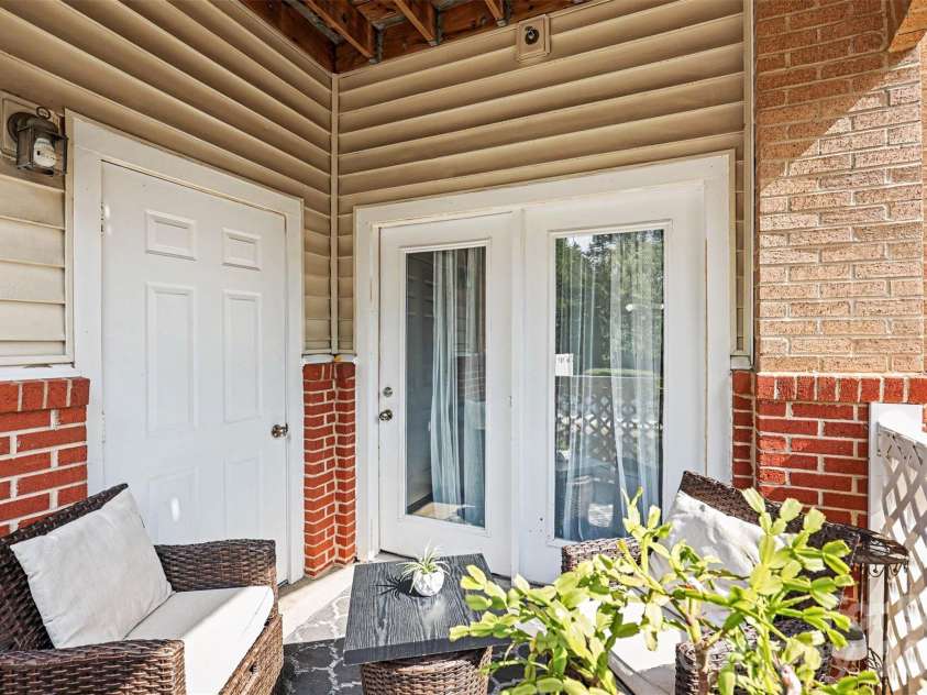 11855 Ridgeway Park Drive, Charlotte, NC 28277.  MLS# CAR4401248, YatesRealty ID 37764. Porch with additional storage