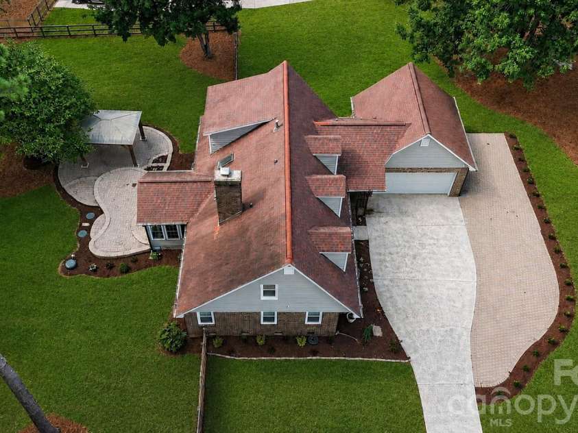 4724 Weddington Matthews Road, Matthews, NC 28104.  MLS# CAR4396504, YatesRealty ID 37770. Virtually enhanced grass