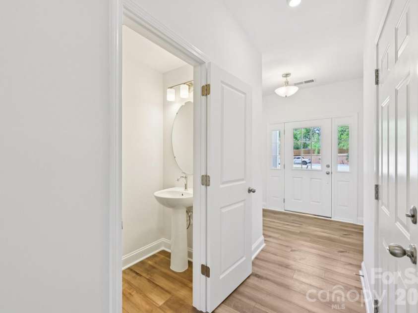 7625 Ethora Way, Charlotte, NC 28216.  MLS# CAR4377533, YatesRealty ID 37773. Entry & Powder Room - Digital Representation.