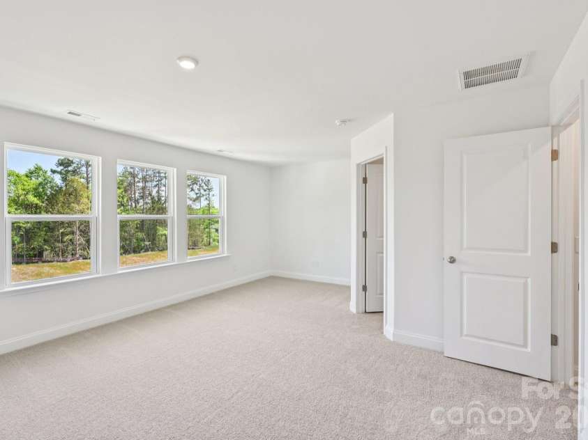 7625 Ethora Way, Charlotte, NC 28216.  MLS# CAR4377533, YatesRealty ID 37773. Owner's Suite - Photo Representative. Home under construction.