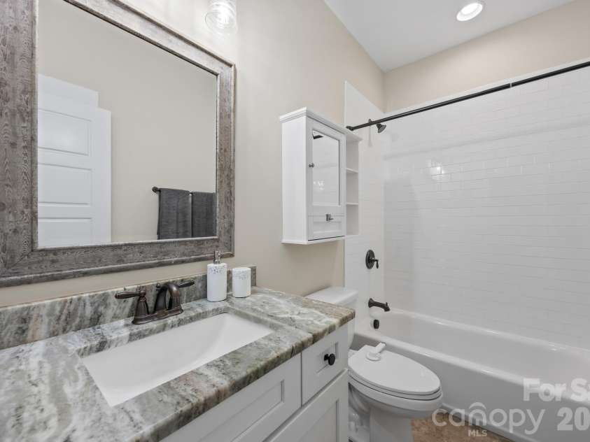 334 McCrary Road, Mooresville, NC 28117.  MLS# CAR4383129, YatesRealty ID 37787. Main floor bathroom.