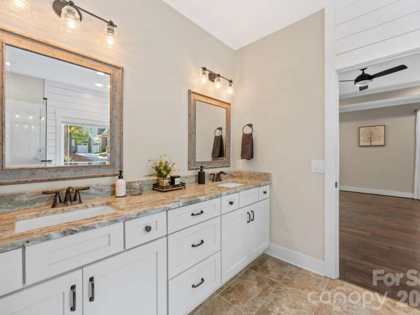 334 McCrary Road, Mooresville, NC 28117.  MLS# CAR4383129, YatesRealty ID 37787. Primary bath with dual vanities.