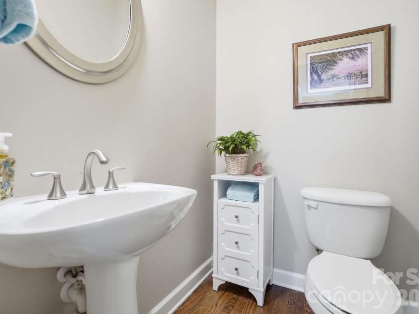 3219 Lakehurst Crossing, Matthews, NC 28104.  MLS# CAR4381031, YatesRealty ID 37790. Half bath on the main.