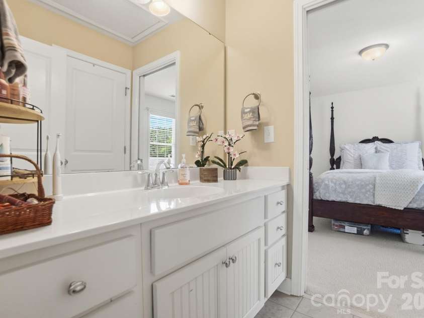 3219 Lakehurst Crossing, Matthews, NC 28104.  MLS# CAR4381031, YatesRealty ID 37790. Jack and Jill bath connecting.