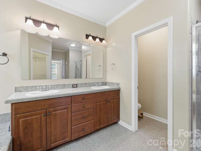 16665 Stokes Ferry Road, Richfield, NC 28137.  MLS# CAR4400480, YatesRealty ID 37796. Double vanitiies