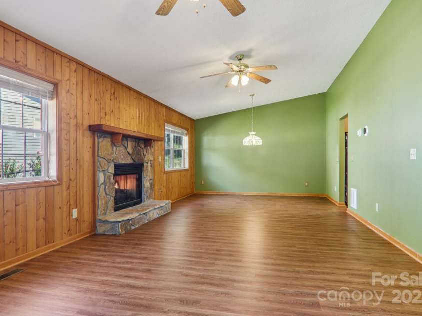 126 Pasco Loop, Waynesville, NC 28785.  MLS# CAR4301663, YatesRealty ID 378. Living room/dining room