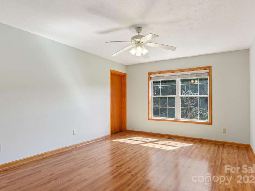 126 Pasco Loop, Waynesville, NC 28785.  MLS# CAR4301663, YatesRealty ID 378. Primary bedroom