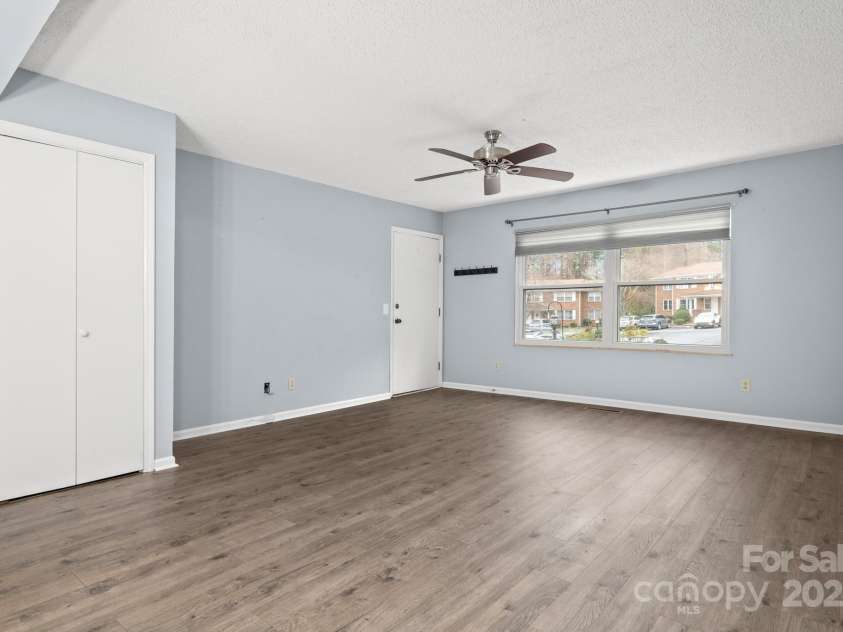 27 Capri Lane, Hendersonville, NC 28791.  MLS# CAR4323104, YatesRealty ID 378. Living Room