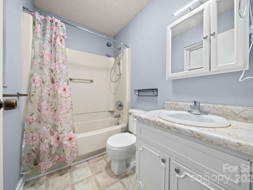 27 Capri Lane, Hendersonville, NC 28791.  MLS# CAR4323104, YatesRealty ID 378. Primary Bath, en suite