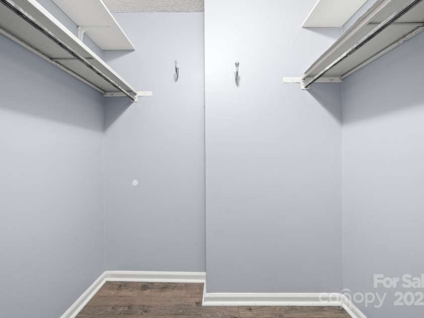 27 Capri Lane, Hendersonville, NC 28791.  MLS# CAR4323104, YatesRealty ID 378. Walk-in Closet, en suite