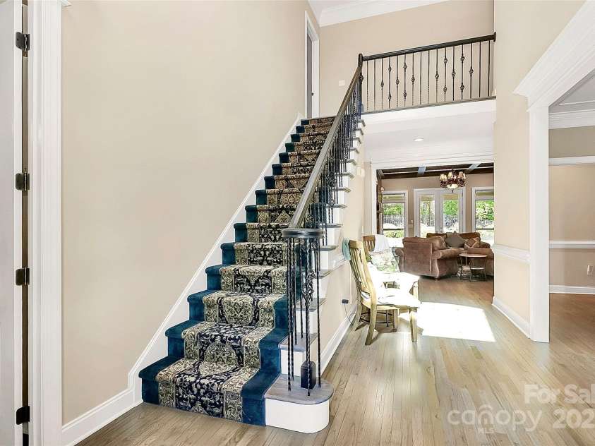 227 Wildwood Cove Drive, Mooresville, NC 28117.  MLS# CAR4214426, YatesRealty ID 3780. Bright and airy 2 story foyer
