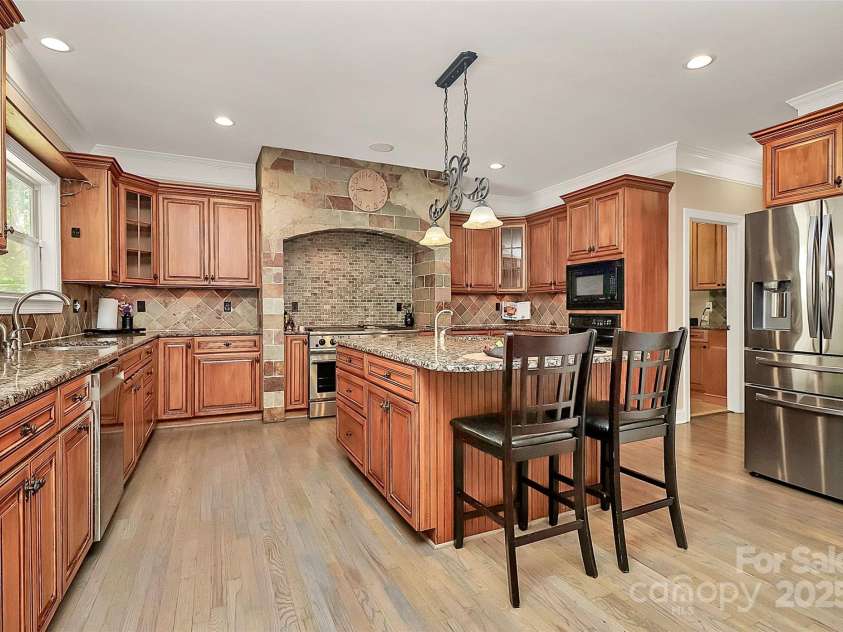 227 Wildwood Cove Drive, Mooresville, NC 28117.  MLS# CAR4214426, YatesRealty ID 3780. Gourmet kitchen