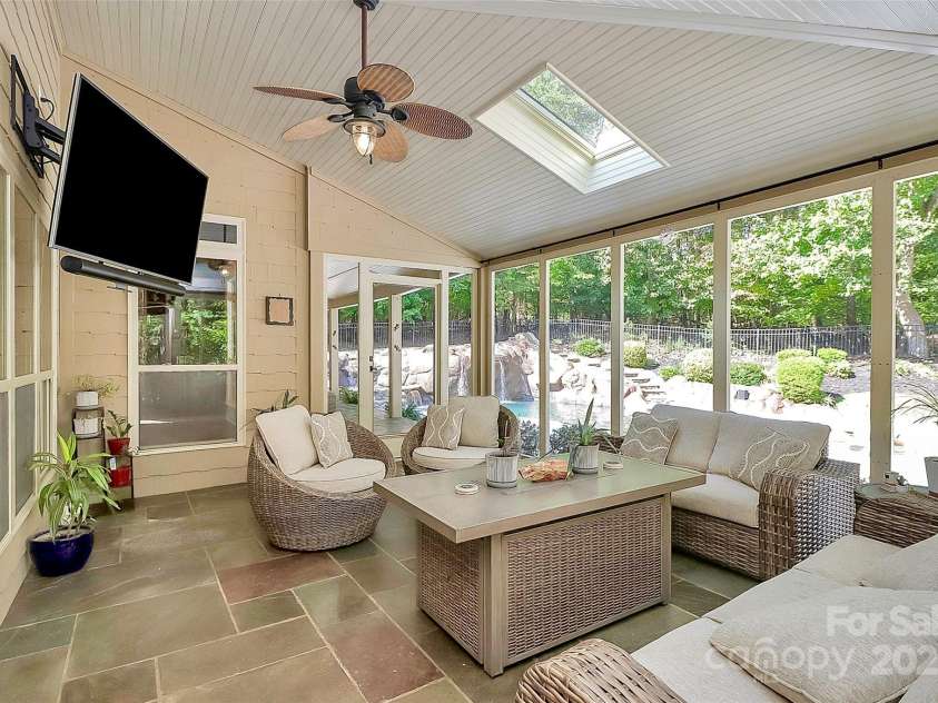 227 Wildwood Cove Drive, Mooresville, NC 28117.  MLS# CAR4214426, YatesRealty ID 3780. Incredible screened in porch