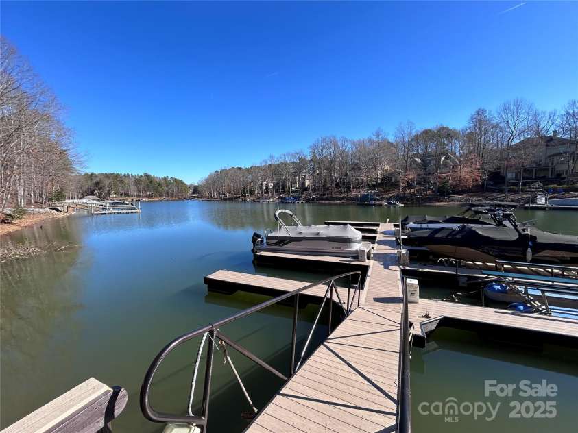 227 Wildwood Cove Drive, Mooresville, NC 28117.  MLS# CAR4214426, YatesRealty ID 3780. New Community Dock. Boat slip is first on left.