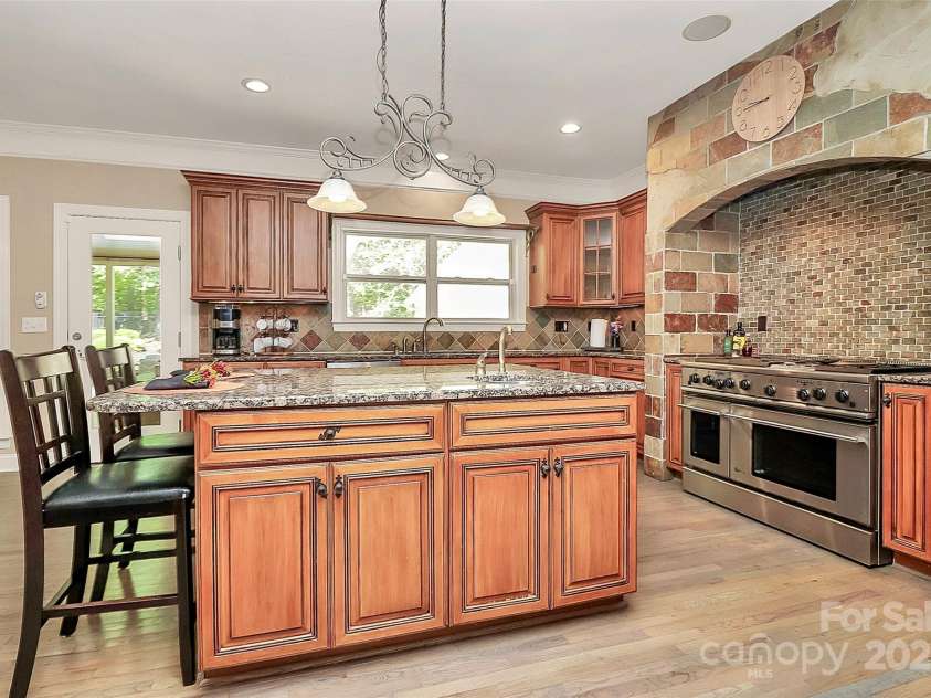 227 Wildwood Cove Drive, Mooresville, NC 28117.  MLS# CAR4214426, YatesRealty ID 3780. Plenty of storage in island and cabinets