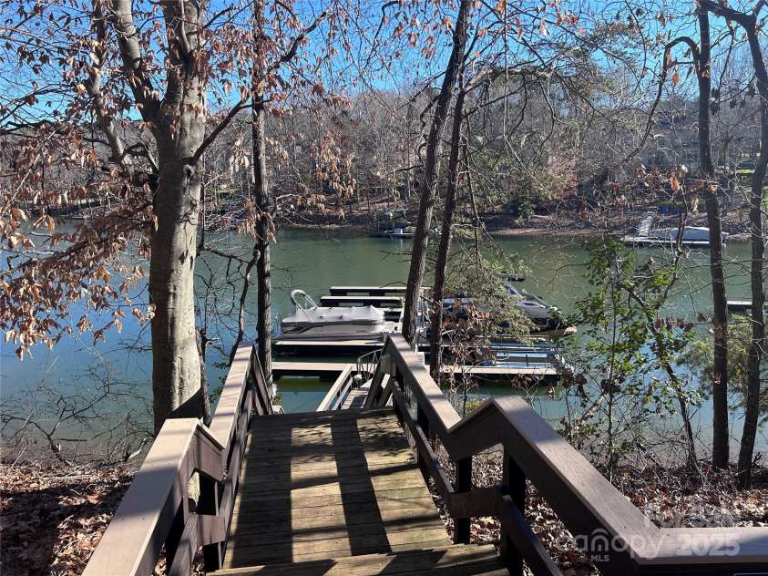 227 Wildwood Cove Drive, Mooresville, NC 28117.  MLS# CAR4214426, YatesRealty ID 3780. Walkway to new community dock