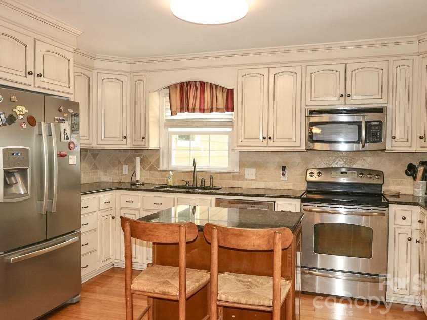 135 Holly Hill Drive, Elkin, NC 28621.  MLS# CAR4395463, YatesRealty ID 37803. 