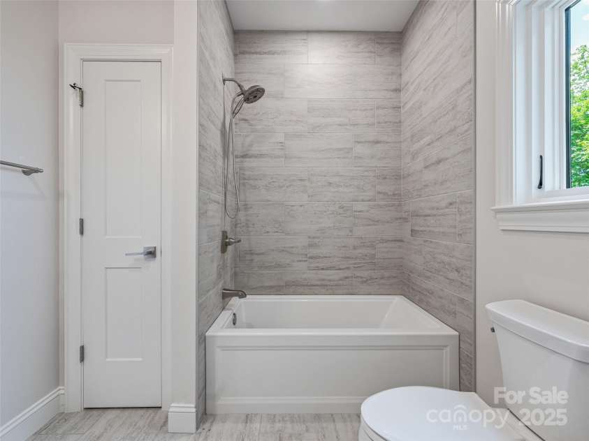 527 Falkirk Way, Zirconia, NC 28790.  MLS# CAR4231554, YatesRealty ID 3781. Large ensuite bedroom