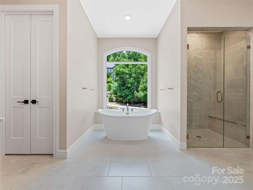 527 Falkirk Way, Zirconia, NC 28790.  MLS# CAR4231554, YatesRealty ID 3781. Primary Bathroom with zero entry shower