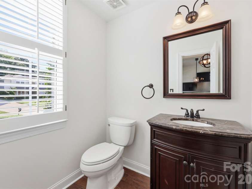 6832 Charter Hills Road, Charlotte, NC 28277.  MLS# CAR4396784, YatesRealty ID 37813. Half Bath on Main