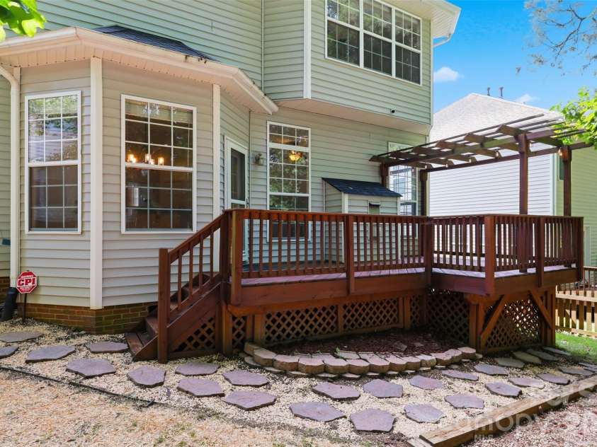 6832 Charter Hills Road, Charlotte, NC 28277.  MLS# CAR4396784, YatesRealty ID 37813. Spacious back deck for entertaining!