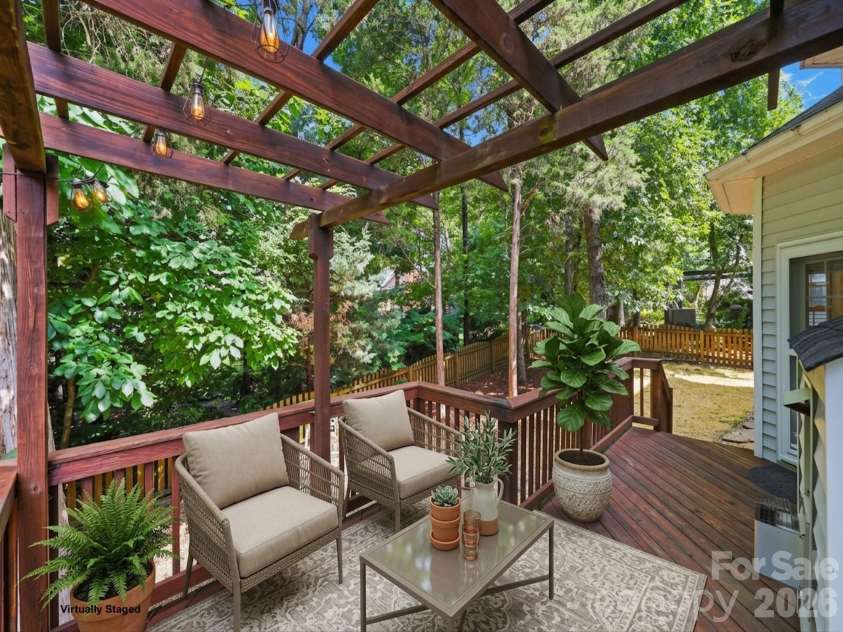6832 Charter Hills Road, Charlotte, NC 28277.  MLS# CAR4396784, YatesRealty ID 37813. Spacious back deck with a pergola for entertaining!