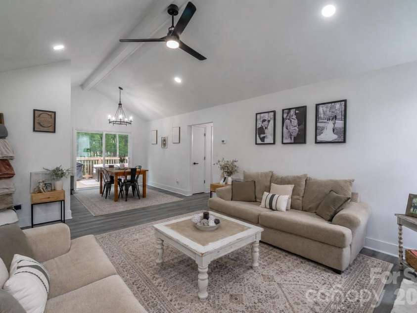 2406 Bearskin Lane, Monroe, NC 28110.  MLS# CAR4396948, YatesRealty ID 37817. Living Room Overlooking Dining Room