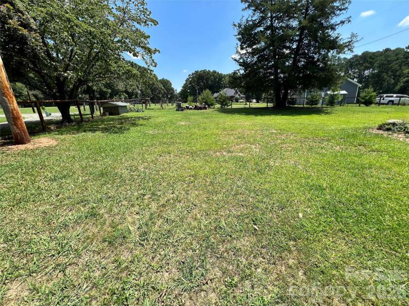 24520 Ridgecrest Road, Locust, NC 28097.  MLS# CAR4404798, YatesRealty ID 37819. Back Yard