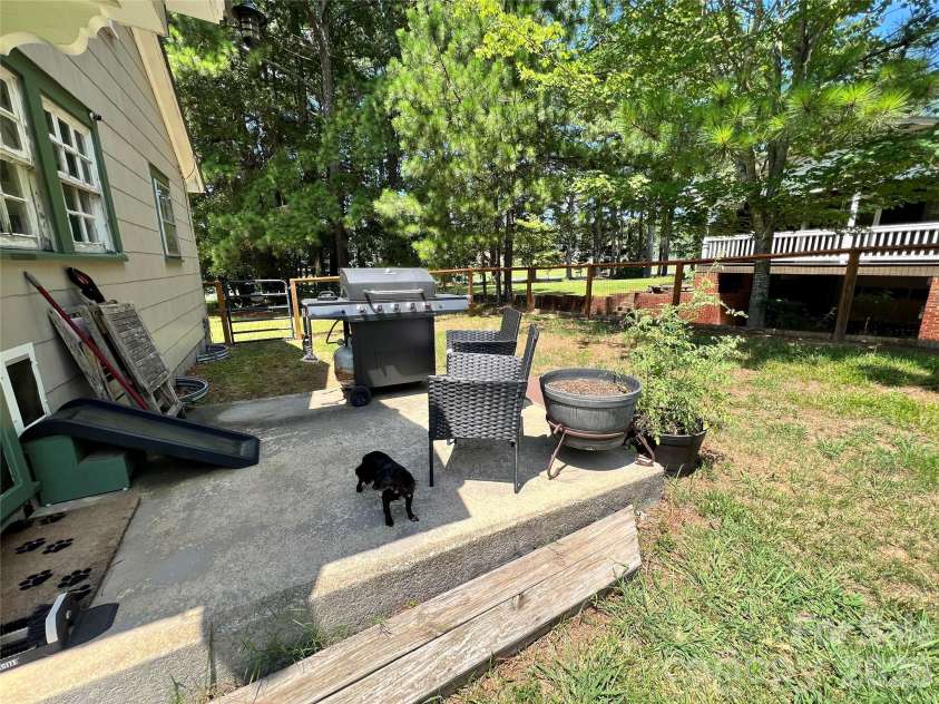 24520 Ridgecrest Road, Locust, NC 28097.  MLS# CAR4404798, YatesRealty ID 37819. Rear - Grilling Deck
