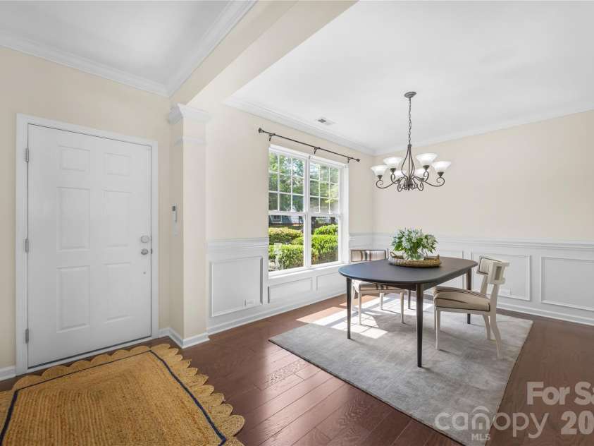 8703 Lake Pines Drive, Cornelius, NC 28031.  MLS# CAR4403233, YatesRealty ID 37820. Foyer Dining