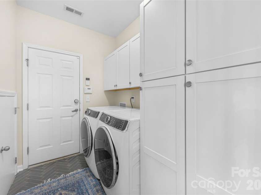 8703 Lake Pines Drive, Cornelius, NC 28031.  MLS# CAR4403233, YatesRealty ID 37820. Main Floor Laundry