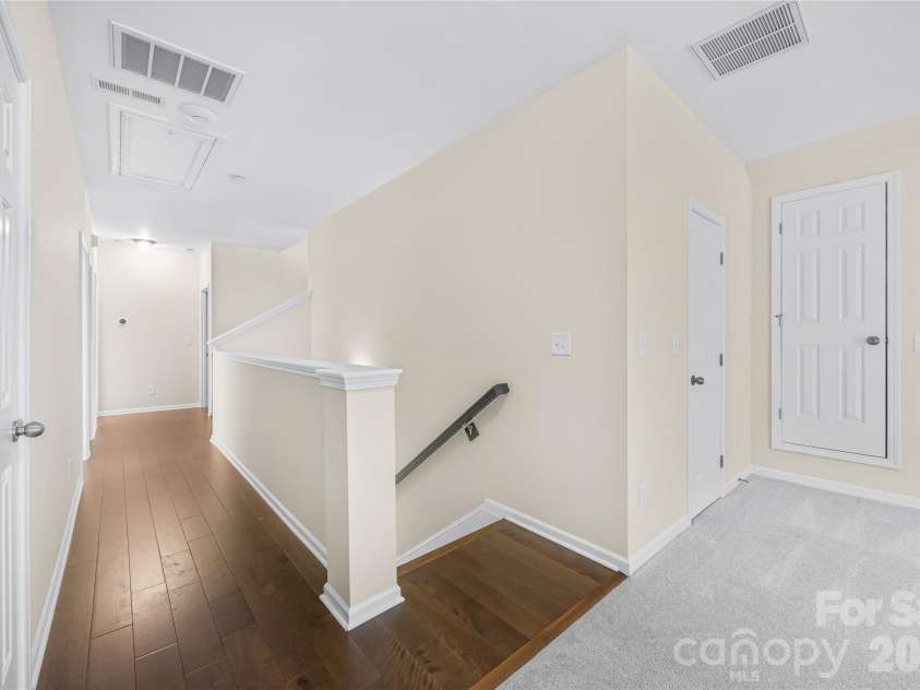8703 Lake Pines Drive, Cornelius, NC 28031.  MLS# CAR4403233, YatesRealty ID 37820. Second Floor Hall