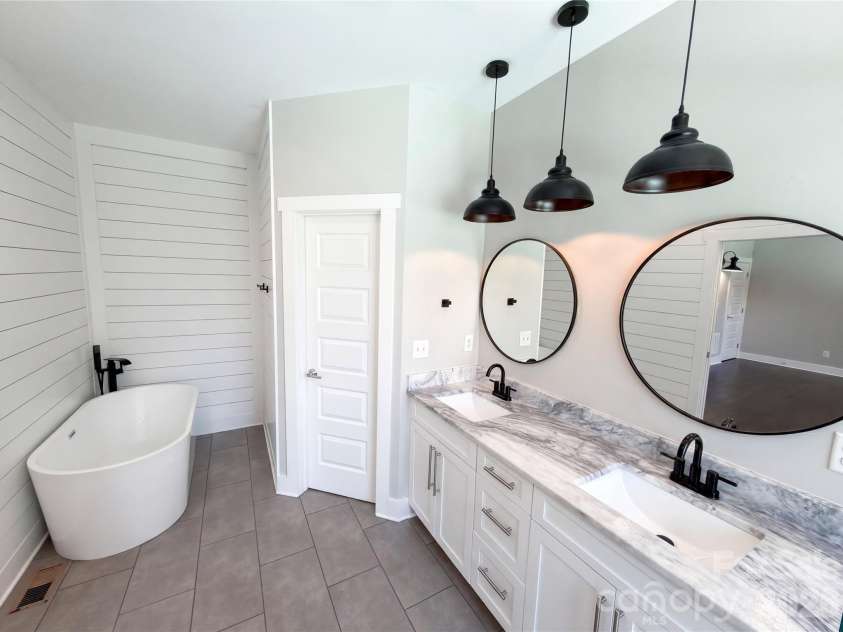 3204 Millstone Creek Road, Lancaster, SC 29720.  MLS# CAR4402581, YatesRealty ID 37821. Primary bathroom main floor