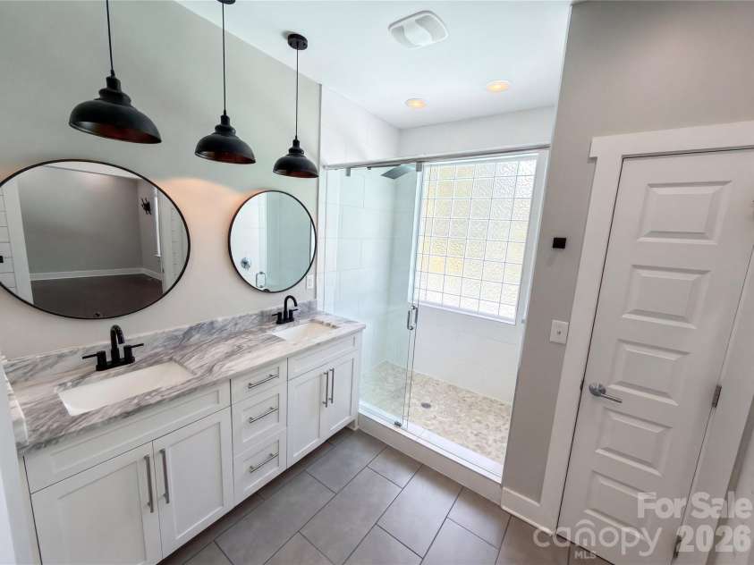 3204 Millstone Creek Road, Lancaster, SC 29720.  MLS# CAR4402581, YatesRealty ID 37821. Primary bathroom main floor