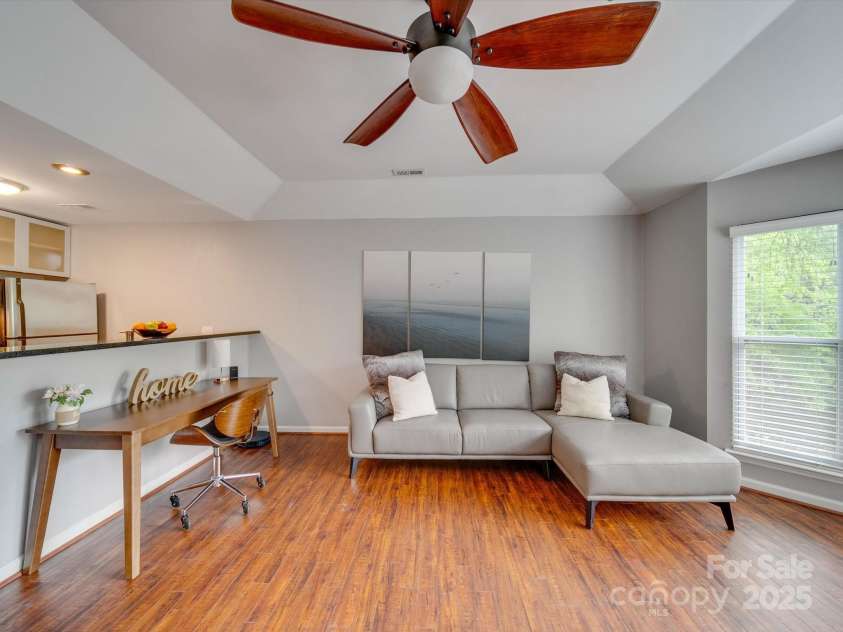 517 Graham Street, Charlotte, NC 28202.  MLS# CAR4247930, YatesRealty ID 3784. LR opened to kitchen
