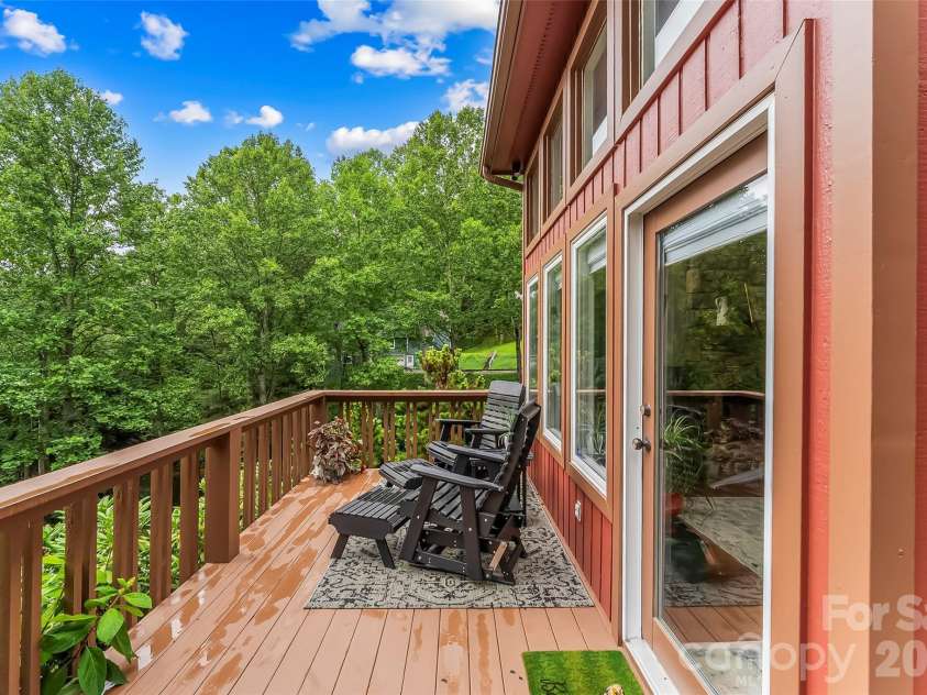 121 Stonecrest Drive, Asheville, NC 28803.  MLS# CAR4404285, YatesRealty ID 37842. Front deck