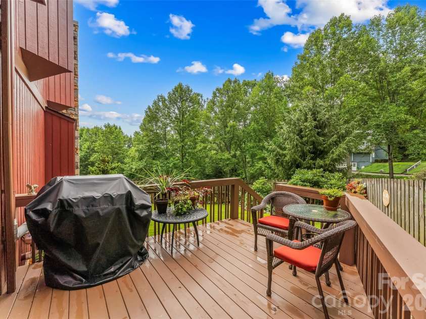 121 Stonecrest Drive, Asheville, NC 28803.  MLS# CAR4404285, YatesRealty ID 37842. Side deck