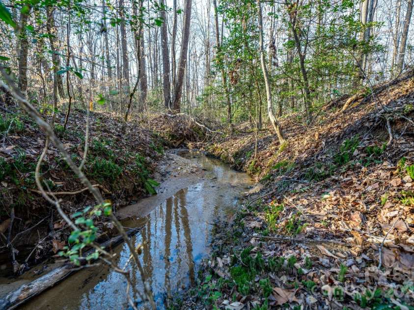 6118 Fox Gap Street, Morganton, NC 28655.  MLS# CAR4228074, YatesRealty ID 3786. Seller says these creeks were used to bring gold off the mountain.