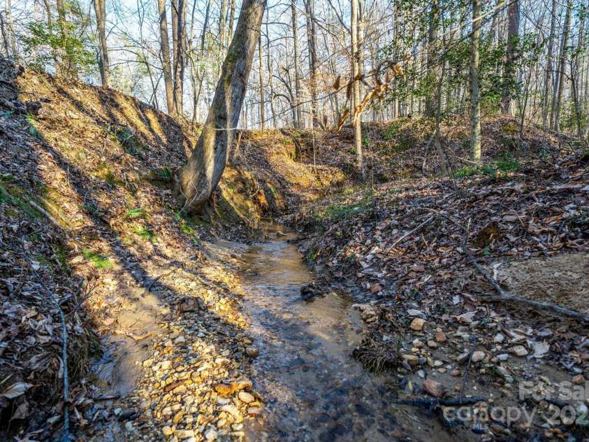 6118 Fox Gap Street, Morganton, NC 28655.  MLS# CAR4228074, YatesRealty ID 3786. Seller says these creeks were used to bring gold off the mountain.