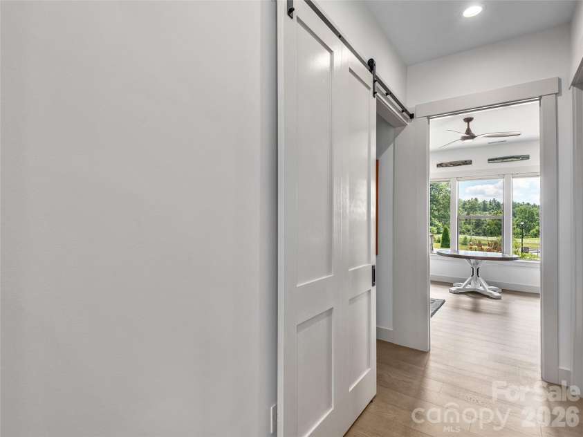 696 Daniel Circle Drive, Mills River, NC 28759.  MLS# CAR4402864, YatesRealty ID 37864. Barn Door for Privacy for 2nd & 3rd Bedrooms
