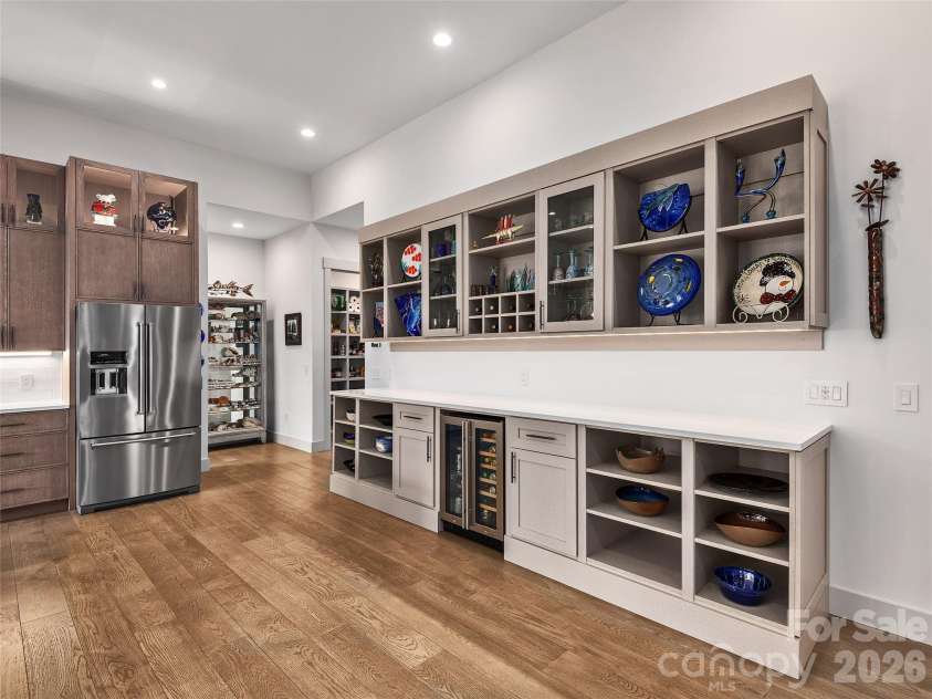 696 Daniel Circle Drive, Mills River, NC 28759.  MLS# CAR4402864, YatesRealty ID 37864. Custom Built Shelves,  Counter, Cabinet and Beverage Cooler