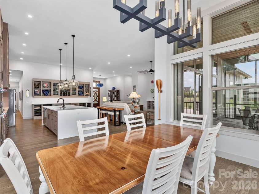 696 Daniel Circle Drive, Mills River, NC 28759.  MLS# CAR4402864, YatesRealty ID 37864. Dining Area Overlooking Chefs Kitchen