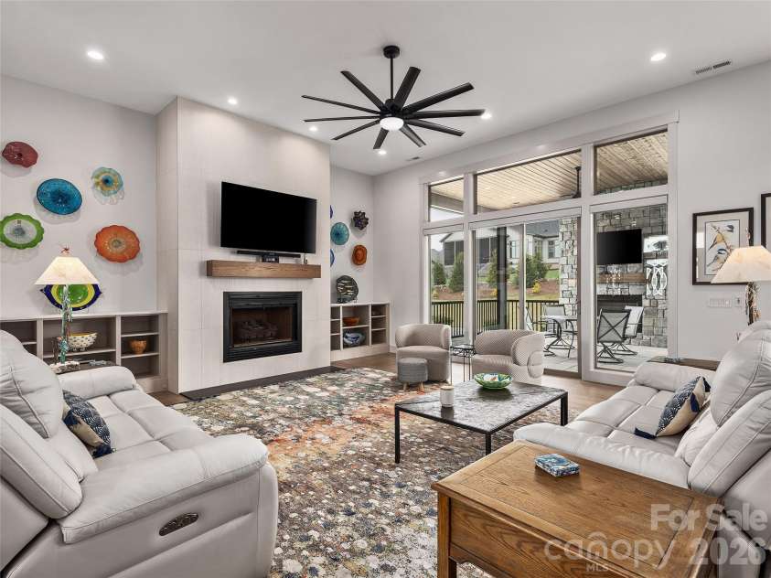 696 Daniel Circle Drive, Mills River, NC 28759.  MLS# CAR4402864, YatesRealty ID 37864. Living Room with Built in Custom Shelves