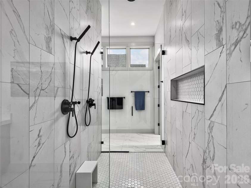 696 Daniel Circle Drive, Mills River, NC 28759.  MLS# CAR4402864, YatesRealty ID 37864. Walk in Shower in Primary Bathroom