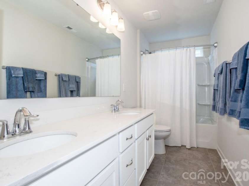 13331 Caite Ridge Road, Davidson, NC 28036.  MLS# CAR4402255, YatesRealty ID 37876. Full bath on the upper level with dual sinks and tub