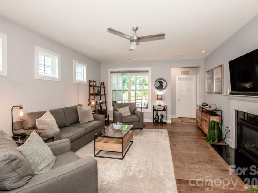 13331 Caite Ridge Road, Davidson, NC 28036.  MLS# CAR4402255, YatesRealty ID 37876. The great room provides ample space for seating