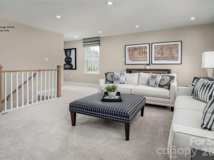 5019 Pineapple Lily Drive, Charlotte, NC 28216.  MLS# CAR4402599, YatesRealty ID 37878. Representative Photo Only